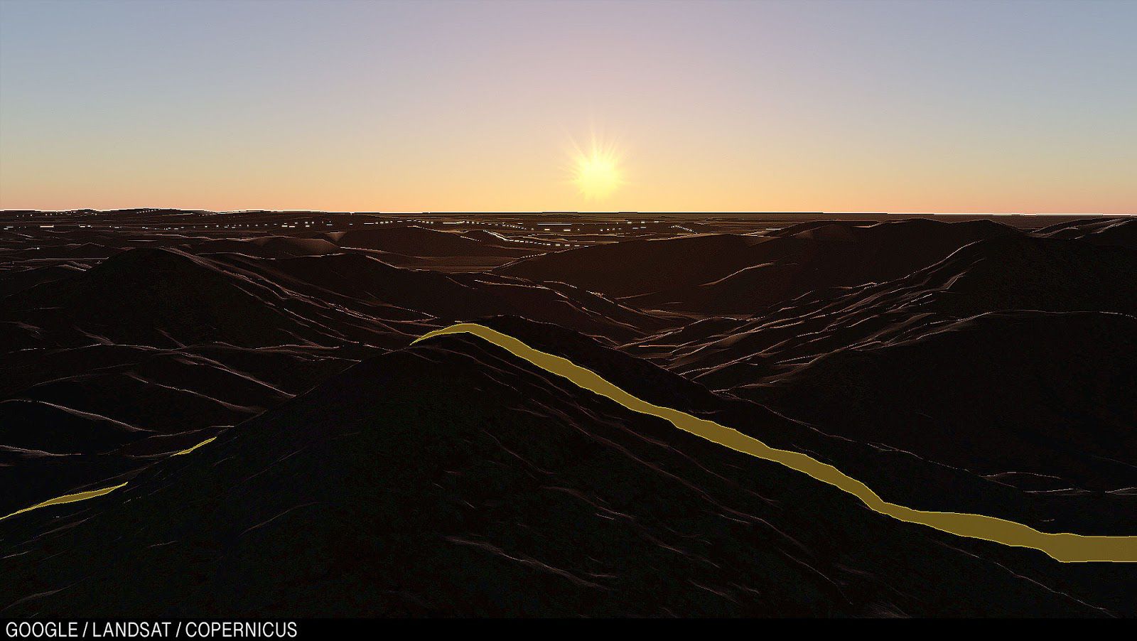 Заход солнца над полем Технологического института Джорджии.
