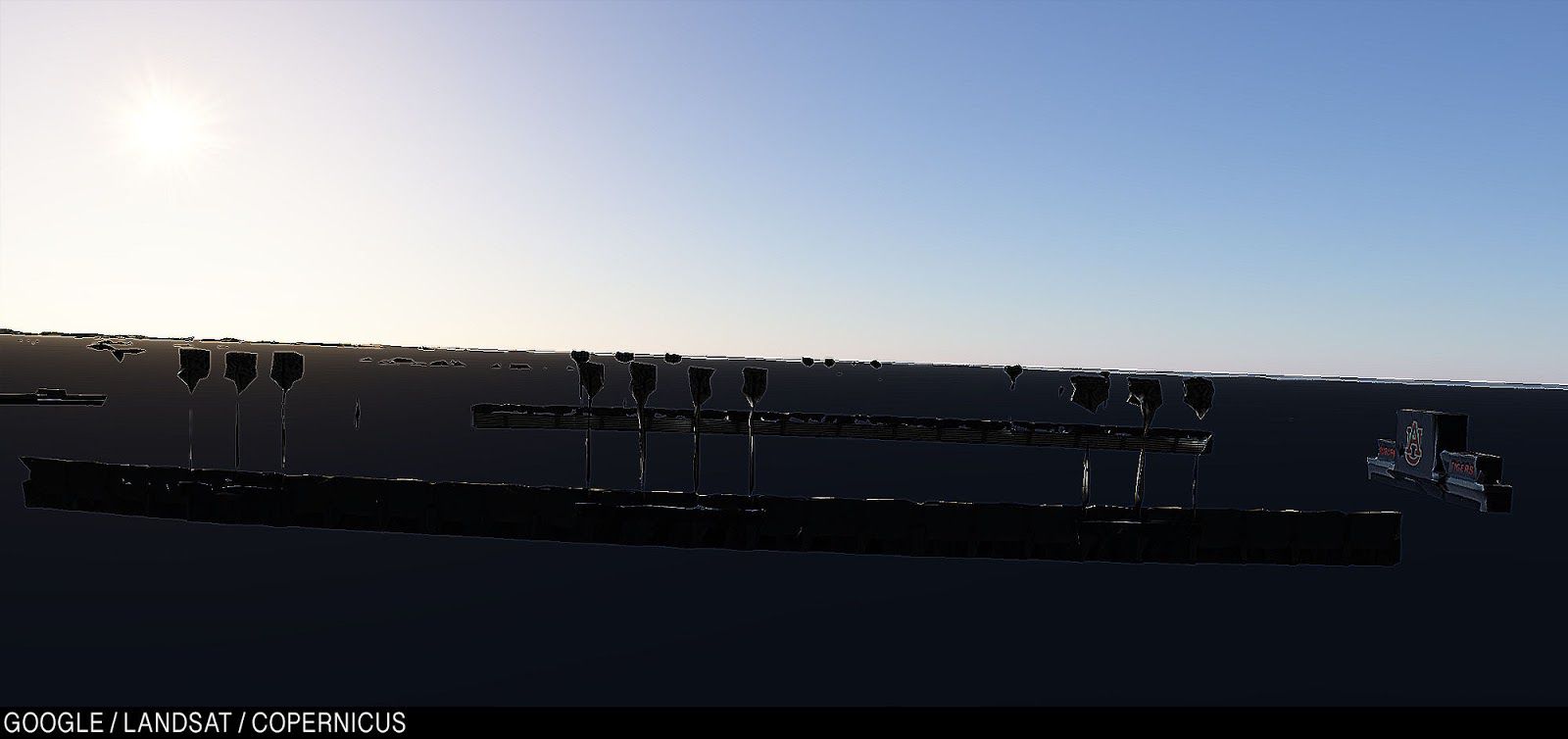 Над водой виднеется верхний край трибун стадиона Джордана — Хейра, старого дома команды Обернского университета.